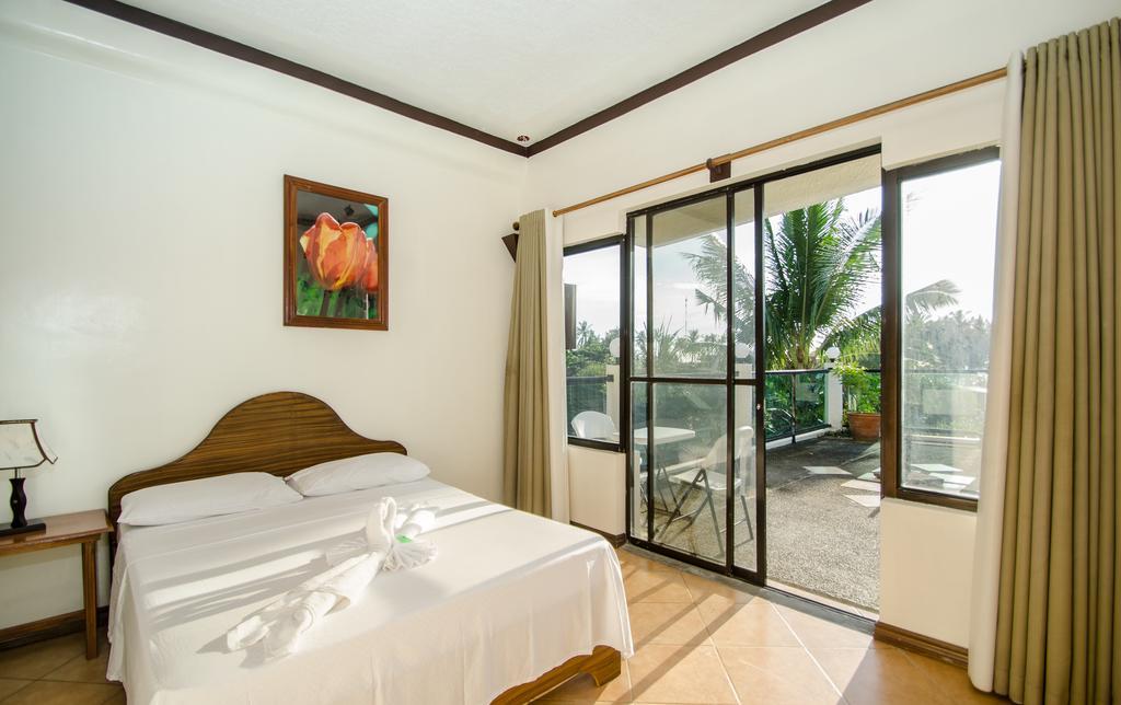 Turtle Inn Resort Manoc-Manoc Δωμάτιο φωτογραφία